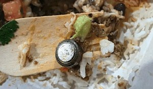 Button battery in burrito bowl at Ripley takeaway