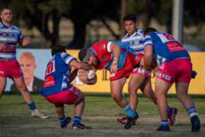 Footy rivals unite in old school traditions on special day