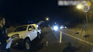 Video shows ute driver smash through roadblock