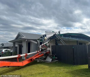 Concrete truck smashes through house