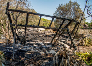 Blaze destroys home, cars